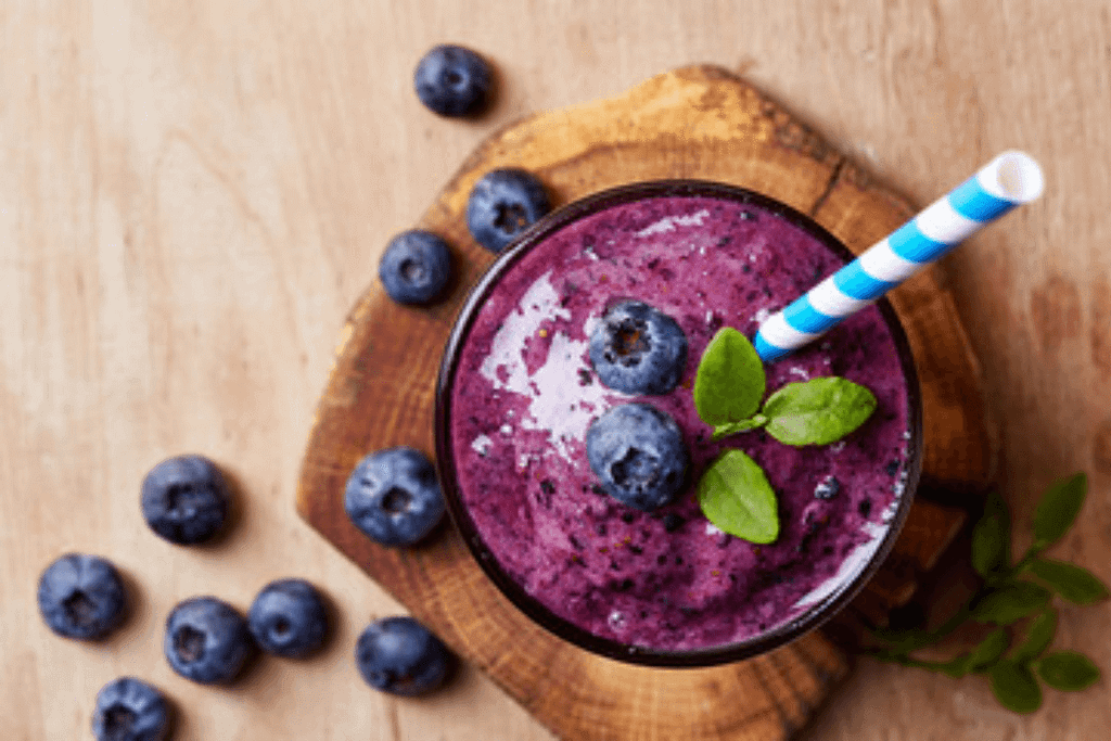 Blueberry smoothie with fresh blueberries and mint